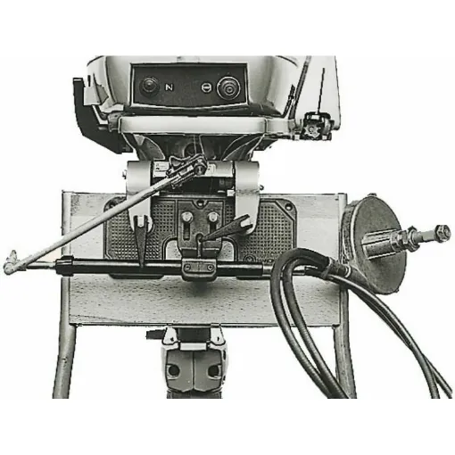 Picture of Device for installing single-cable steering systems on motorized inflatable boats with outboard engines not designed for the insertion of the cable into the steering tube. This device avoids the need to attach the steering cable to the transom of the inflatable boat. It is a universal model. It is made of anodized aluminum and consists of an article 47.763.92 plate + an adjustable clamp + steering